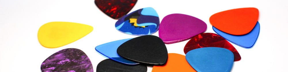 Acetal Guitar picks laid on a table