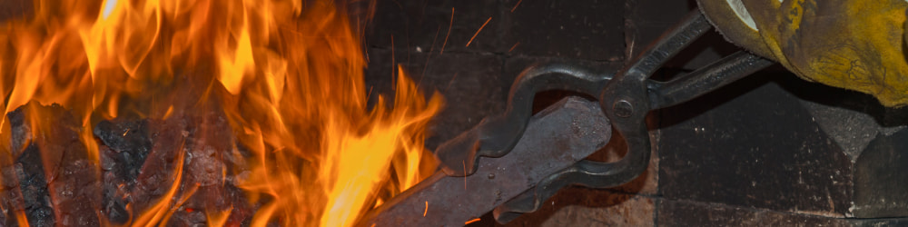 Steel bar being heated in a forge