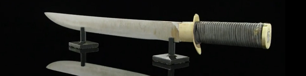 Forged in fire contestant Erik Hemker blade on display