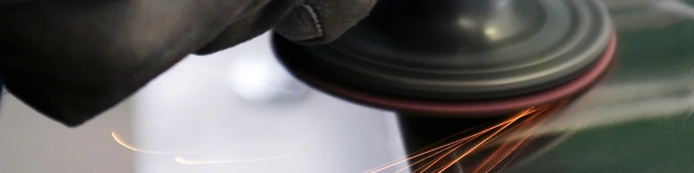 Buffer polishing a piece of metal