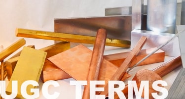 Various metal products laid out on a table
