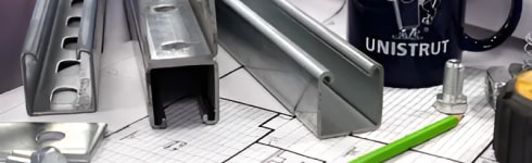 Unistrut bars and data sheets on a table