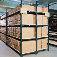 Unistrut storage racks and shelving holding supplies in a warehouse