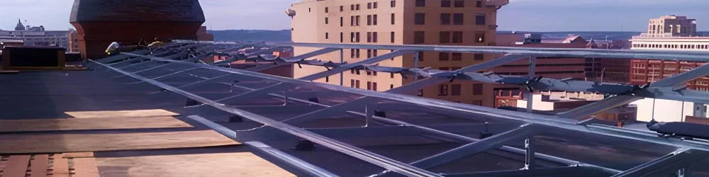 Unistrut bar being used on a city roof top