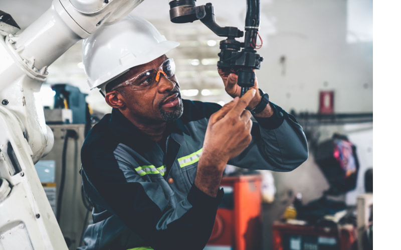 Engineer working on robot